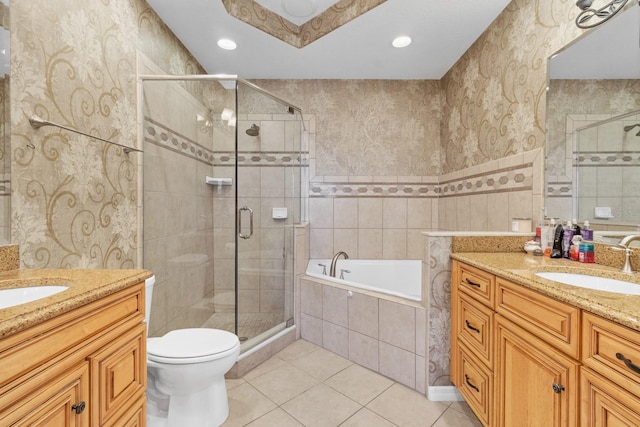 full bathroom featuring tile patterned flooring, vanity, plus walk in shower, and toilet