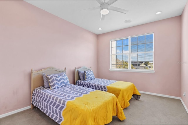 carpeted bedroom with ceiling fan