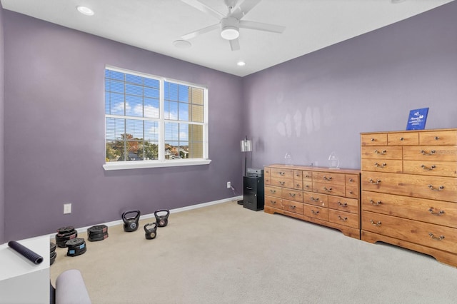 interior space with ceiling fan