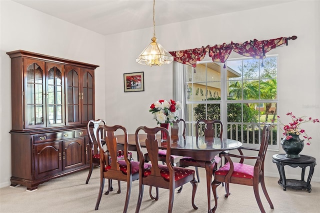 dining area with light carpet