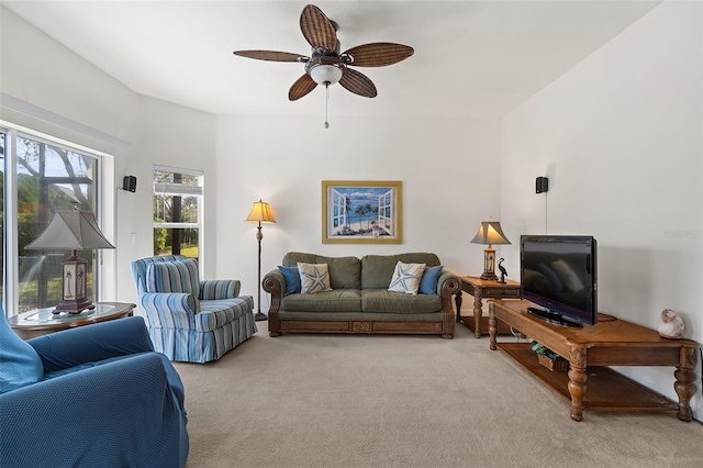 living room featuring ceiling fan and carpet flooring