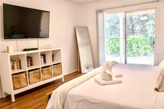 bedroom featuring wood-type flooring