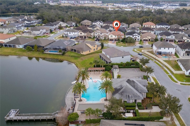 drone / aerial view with a water view