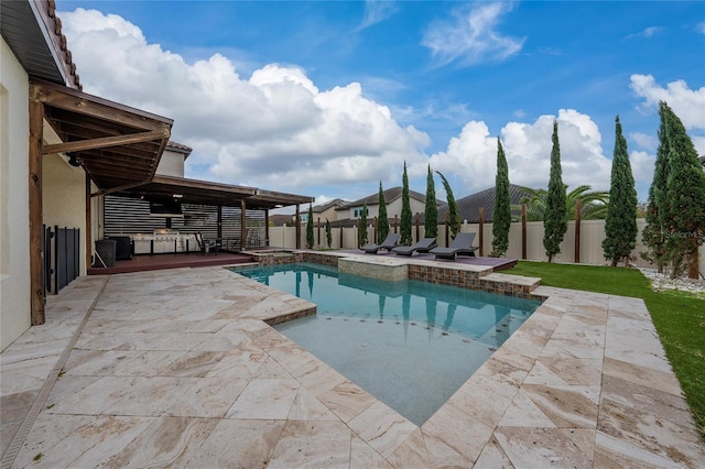 view of swimming pool featuring a patio area