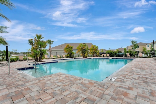 view of swimming pool featuring a patio