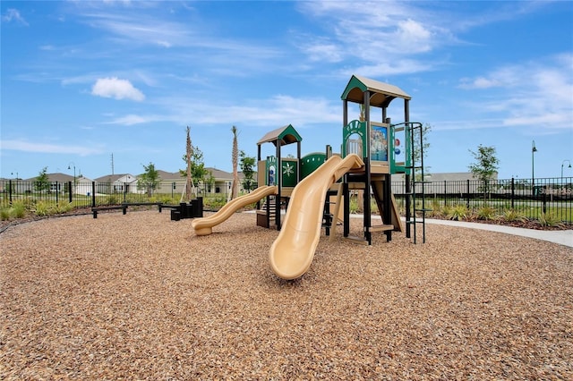 community jungle gym with fence