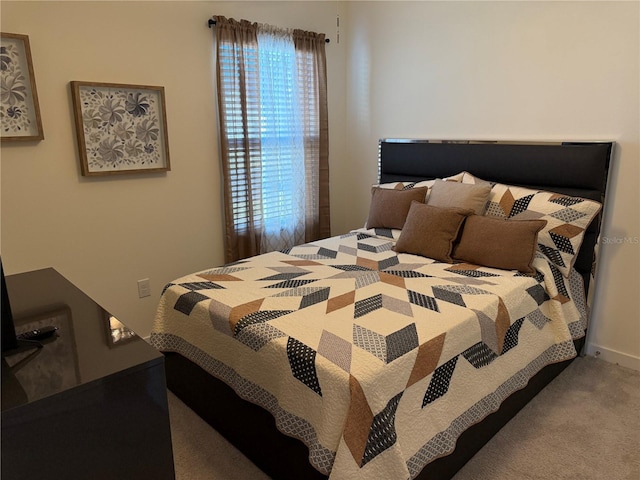 bedroom featuring carpet floors