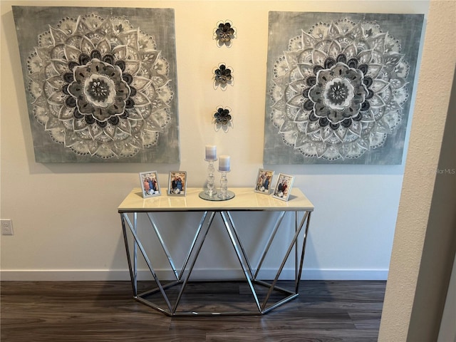 interior details with wood finished floors and baseboards