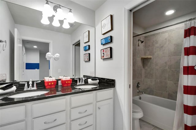 full bathroom featuring vanity, shower / bath combo, tile patterned floors, and toilet