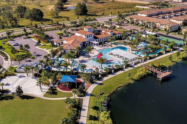 birds eye view of property with a water view