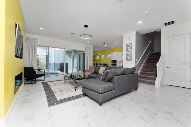 living room featuring a textured ceiling