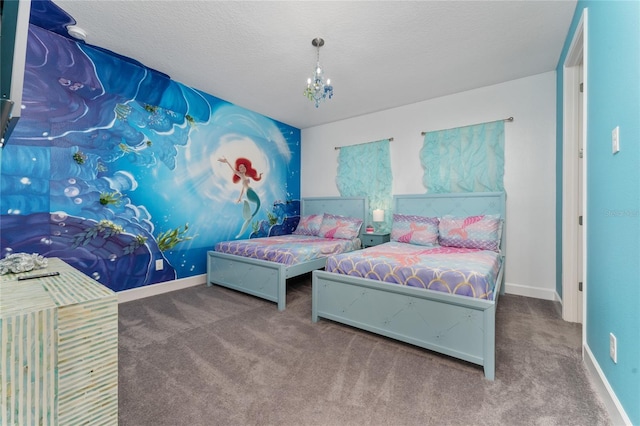 bedroom featuring a chandelier, carpet, and a textured ceiling