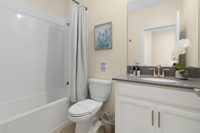 full bathroom featuring vanity, shower / bathtub combination with curtain, and toilet