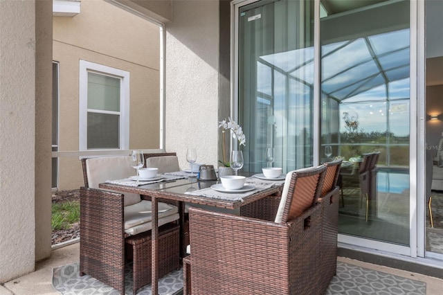 view of patio / terrace with glass enclosure