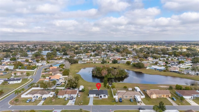 drone / aerial view with a water view