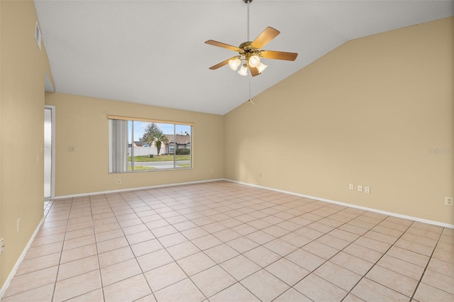 empty room featuring ceiling fan and vaulted ceiling