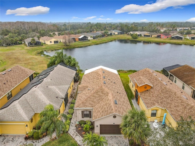 bird's eye view with a water view