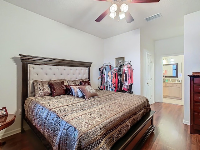 bedroom with wood-type flooring and ceiling fan