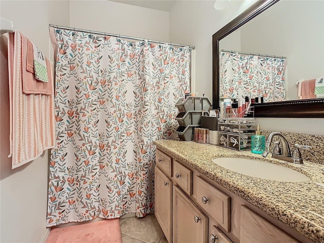 bathroom featuring vanity and tile patterned floors