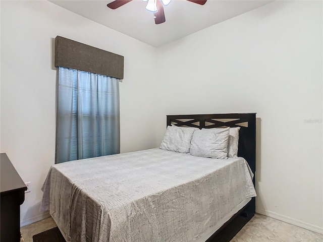 bedroom featuring ceiling fan