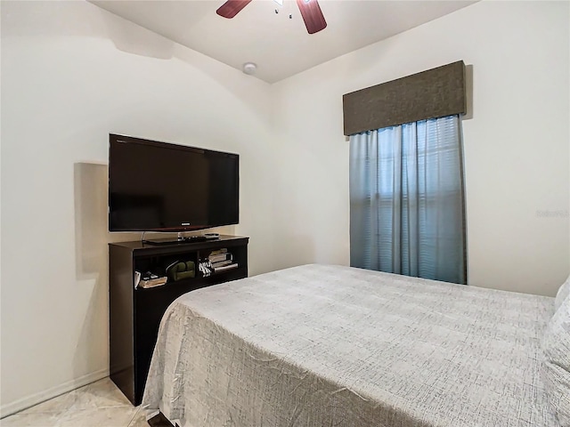 bedroom featuring ceiling fan