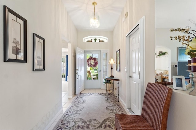 entryway with light tile patterned floors