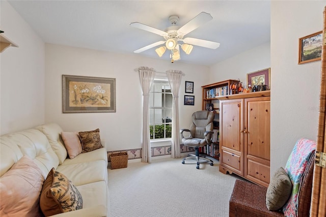 office featuring carpet and ceiling fan