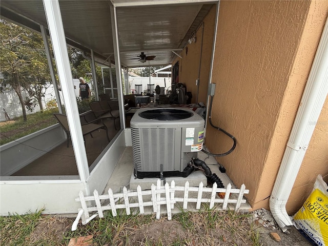 exterior details with ceiling fan and central AC unit