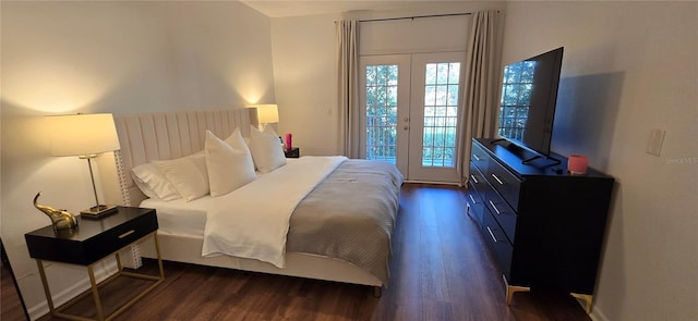 bedroom featuring french doors, dark hardwood / wood-style floors, and access to exterior