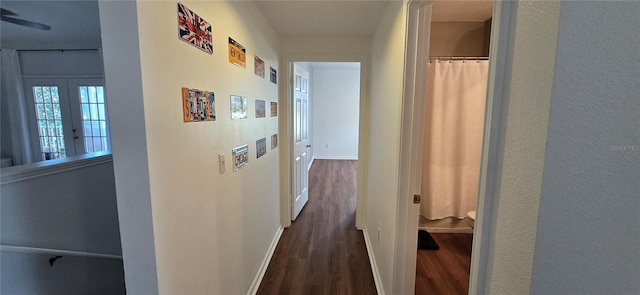 hall with dark hardwood / wood-style floors