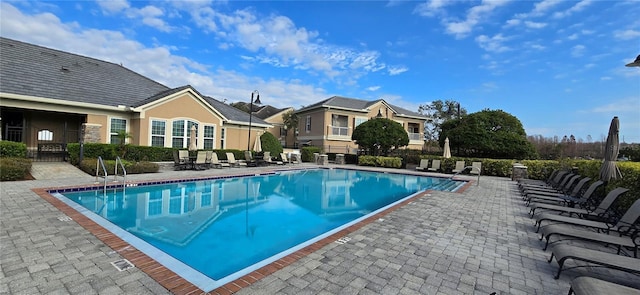 view of swimming pool with a patio