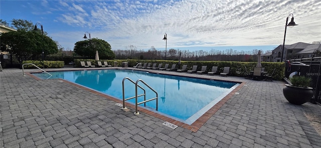 view of pool featuring a patio area