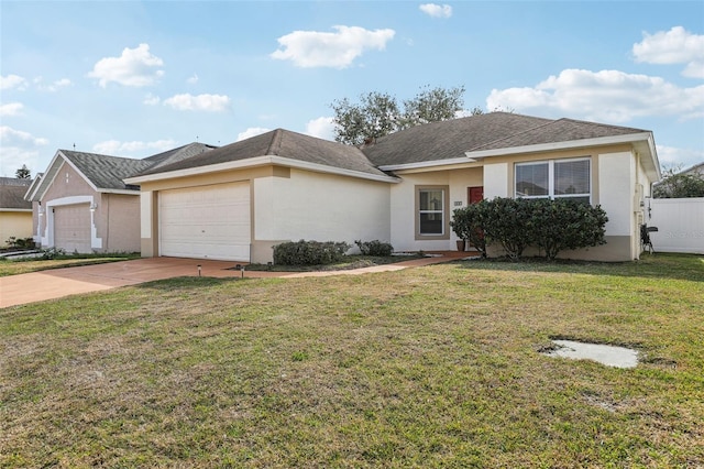 view of front of home featuring a garage and a front yard