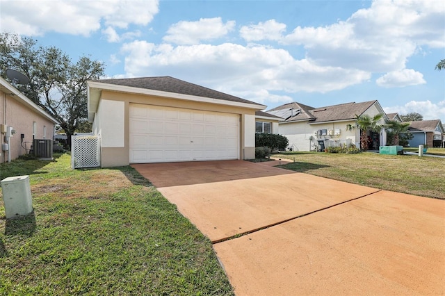 ranch-style house featuring cooling unit, a garage, and a front lawn