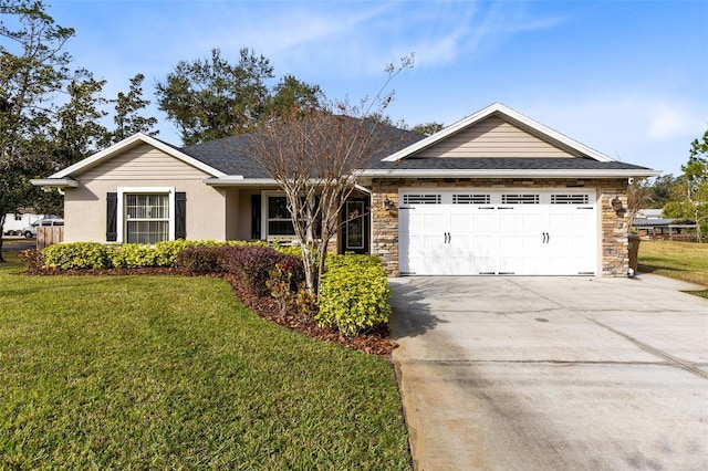 ranch-style house featuring a garage and a front lawn