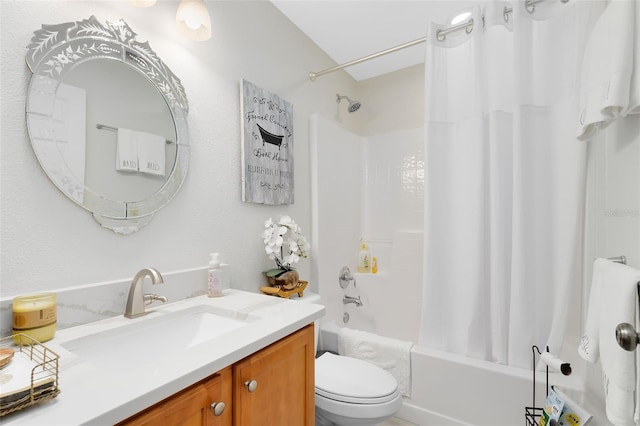 full bathroom featuring vanity, shower / bath combination with curtain, and toilet