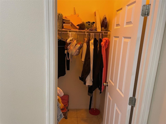 spacious closet featuring tile patterned floors