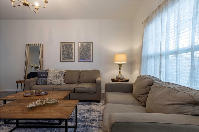 living room featuring an inviting chandelier