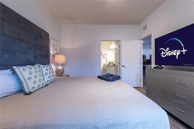 bedroom featuring wood-type flooring