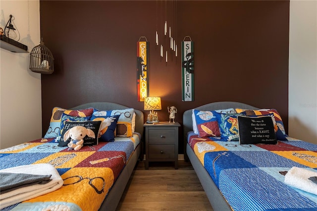 bedroom featuring dark wood-type flooring