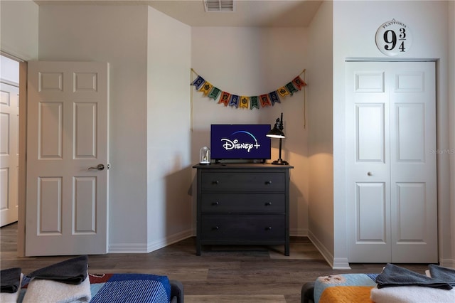 interior space with dark hardwood / wood-style floors