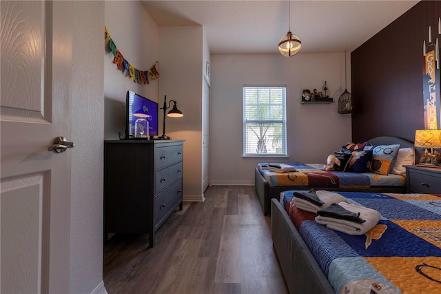 bedroom featuring hardwood / wood-style flooring