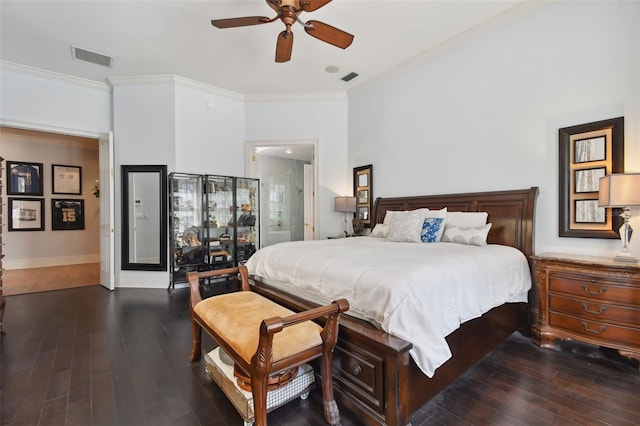 bedroom with ceiling fan, ornamental molding, dark hardwood / wood-style flooring, and ensuite bathroom