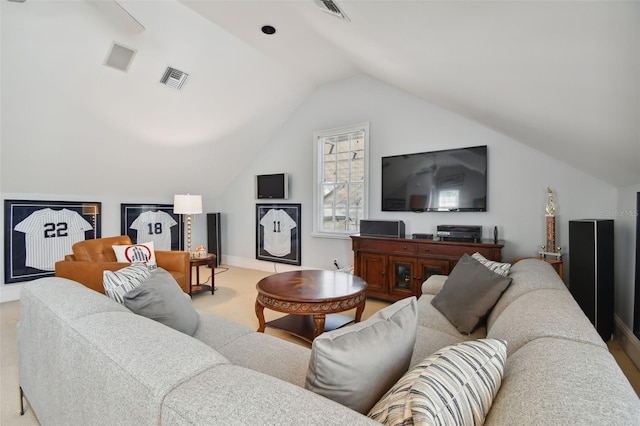 living room featuring lofted ceiling