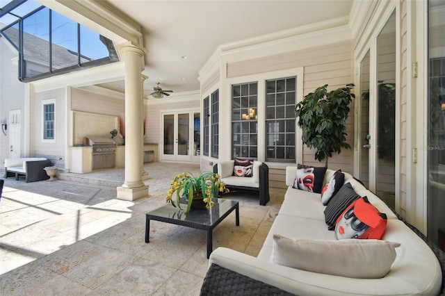 view of patio featuring french doors, ceiling fan, a grill, an outdoor hangout area, and exterior kitchen