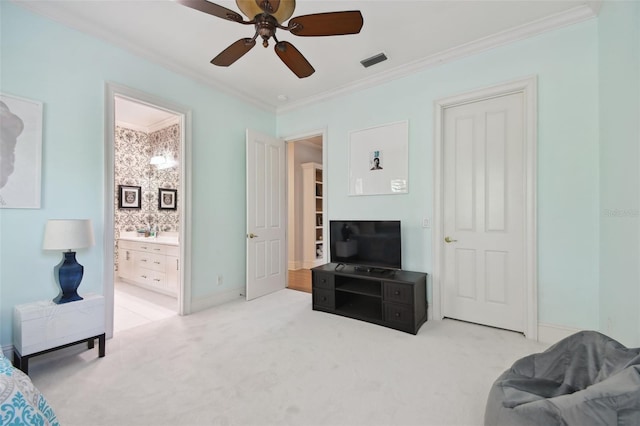 carpeted living room with crown molding and ceiling fan