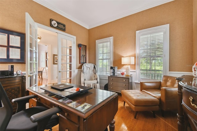 office space with french doors, ornamental molding, and wood-type flooring