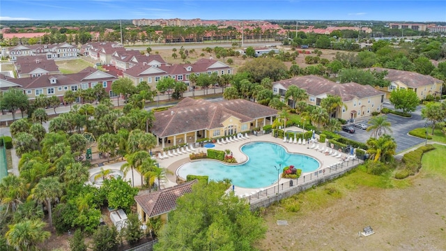 birds eye view of property with a residential view