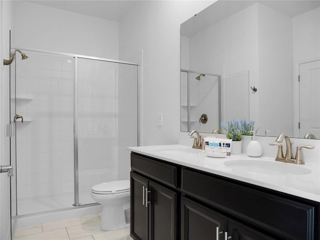 bathroom with vanity, walk in shower, and toilet