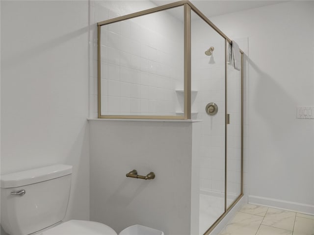 bathroom with toilet and walk in shower